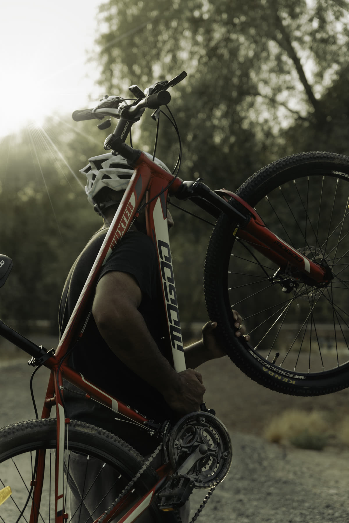 Lifestyle brand photography, cyclist at golden hour